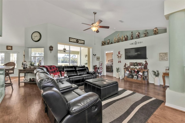 living room featuring ceiling fan, high vaulted ceiling, and hardwood / wood-style flooring