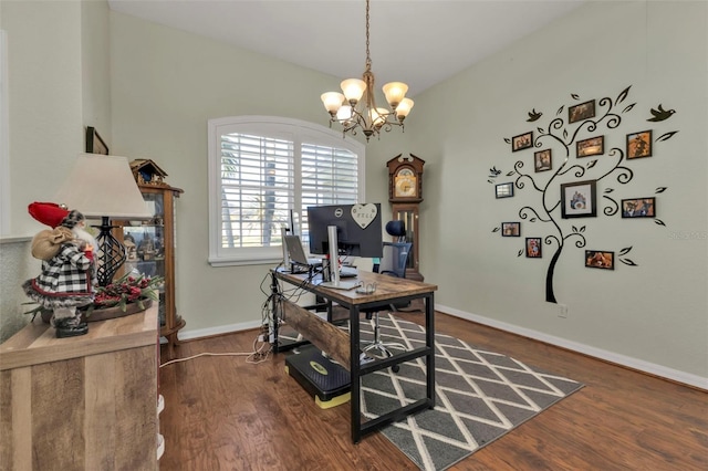 office space featuring dark hardwood / wood-style floors and an inviting chandelier