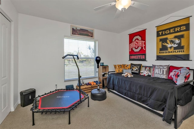 bedroom featuring ceiling fan and carpet floors