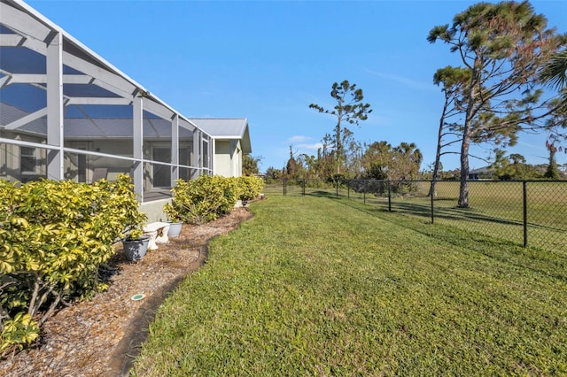 view of yard featuring a lanai