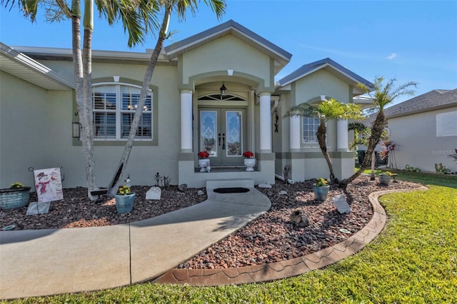 entrance to property featuring french doors