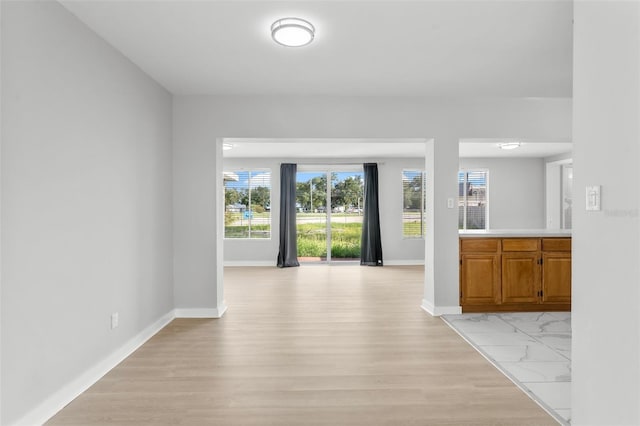 hallway featuring light hardwood / wood-style flooring