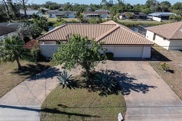 view of front facade with a front lawn and a garage