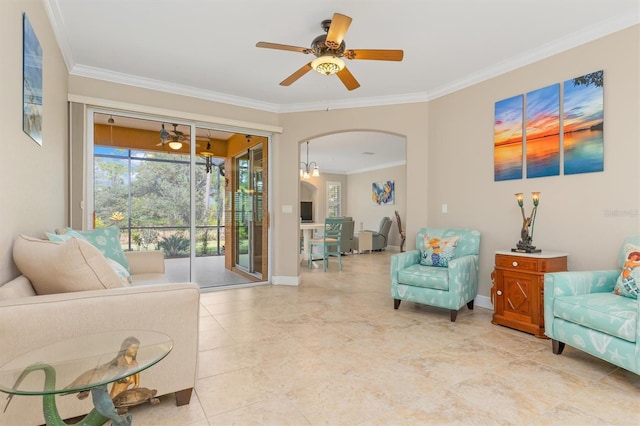 living room featuring ceiling fan and ornamental molding