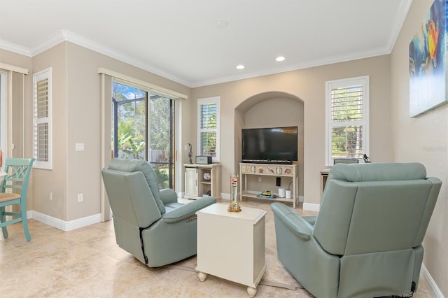 living room featuring light tile patterned floors, a wealth of natural light, and ornamental molding