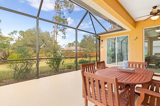 sunroom / solarium with ceiling fan