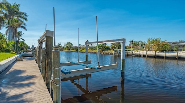 dock area featuring a water view