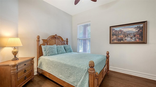 bedroom featuring ceiling fan and dark wood-type flooring