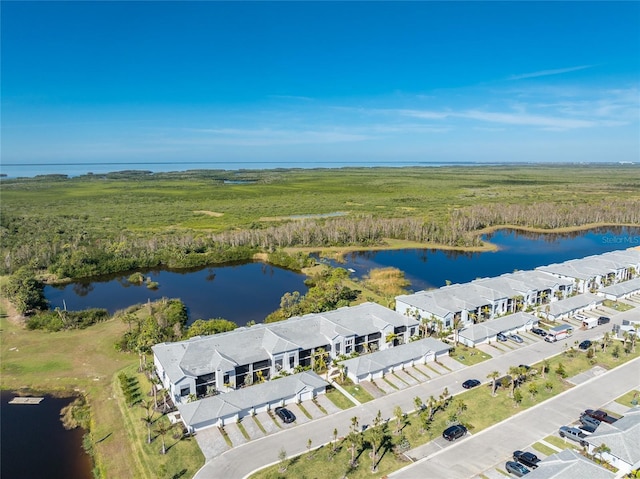 bird's eye view with a water view