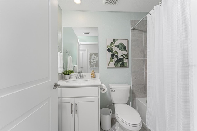 full bathroom featuring vanity, toilet, and shower / tub combo with curtain