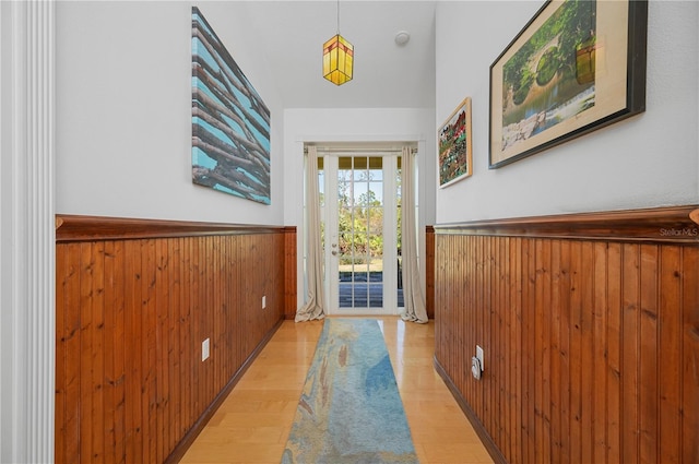 doorway with light hardwood / wood-style flooring