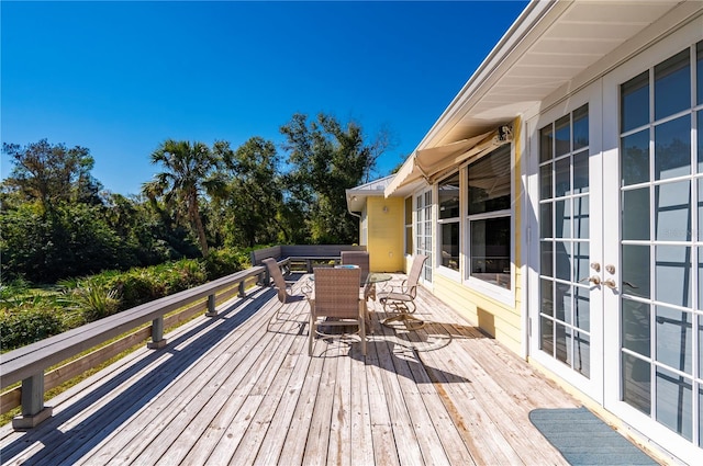 wooden deck with french doors