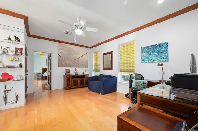 office area featuring ceiling fan, light hardwood / wood-style flooring, and ornamental molding