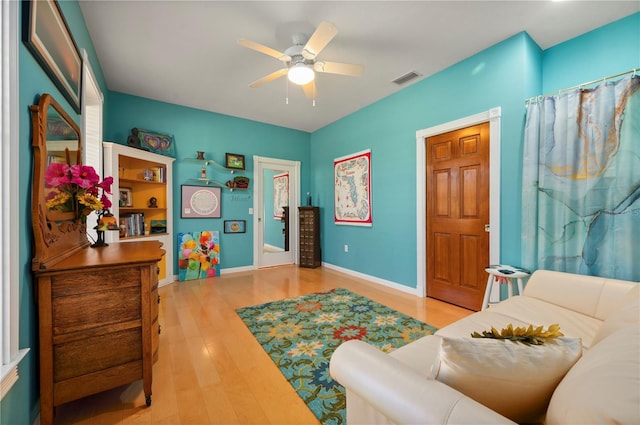 interior space featuring ceiling fan and light hardwood / wood-style flooring