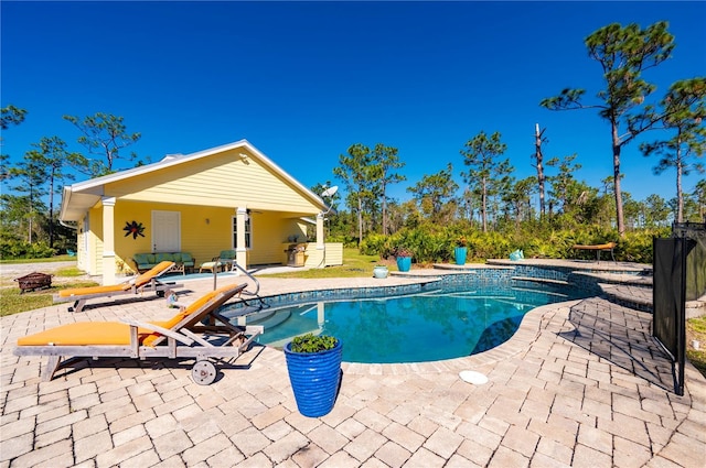 view of pool featuring a patio