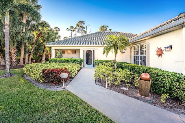 view of front of home with a front yard