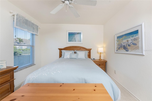 bedroom featuring ceiling fan