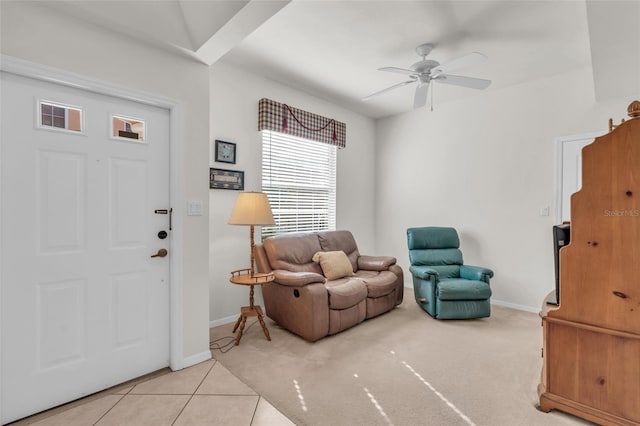 foyer entrance featuring ceiling fan and light tile patterned floors