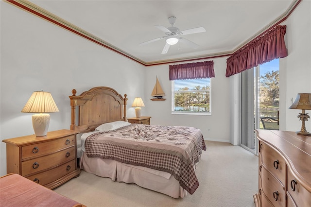 bedroom featuring access to exterior, ceiling fan, light colored carpet, and ornamental molding