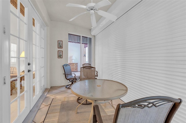 sitting room featuring french doors, ceiling fan, and light tile patterned flooring