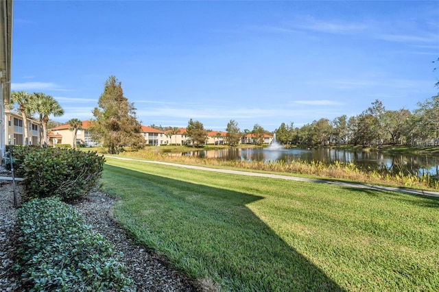 view of yard with a water view