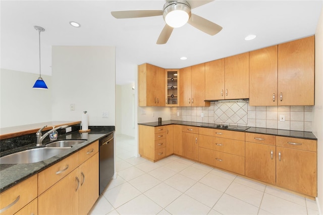 kitchen with dark stone counters, ceiling fan, black appliances, sink, and decorative light fixtures