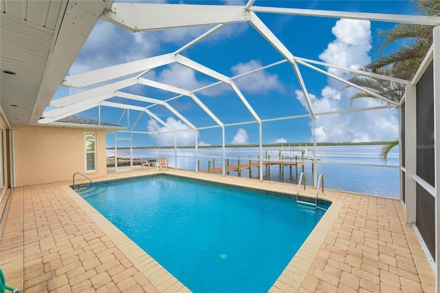 view of swimming pool with a lanai, a water view, a patio, and a boat dock