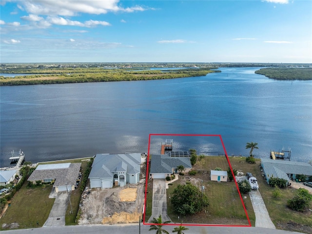 bird's eye view with a water view