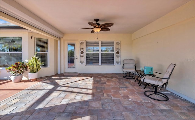 view of patio with ceiling fan