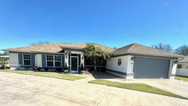 ranch-style home with a garage