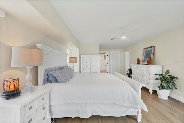 bedroom with ceiling fan and light hardwood / wood-style flooring