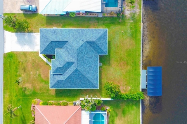 birds eye view of property featuring a water view