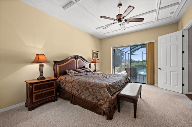 bedroom with a textured ceiling, ceiling fan, access to exterior, and light carpet