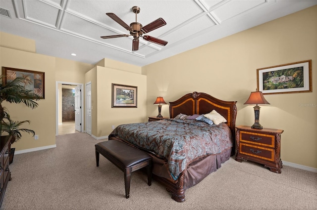 bedroom with ceiling fan, ensuite bathroom, and light carpet