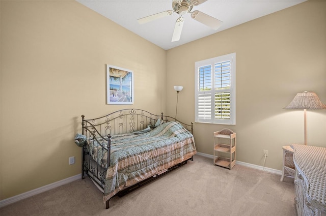 bedroom with light colored carpet and ceiling fan