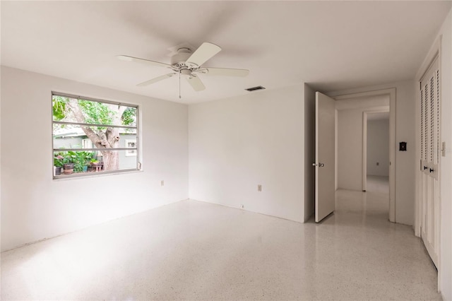 empty room with ceiling fan