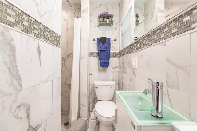 bathroom featuring a shower with shower curtain, toilet, and tile walls