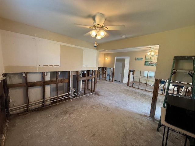 interior space featuring ceiling fan