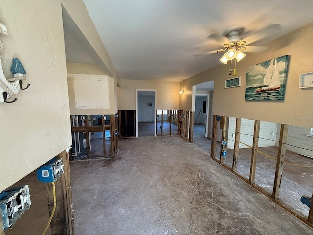 interior space featuring ceiling fan