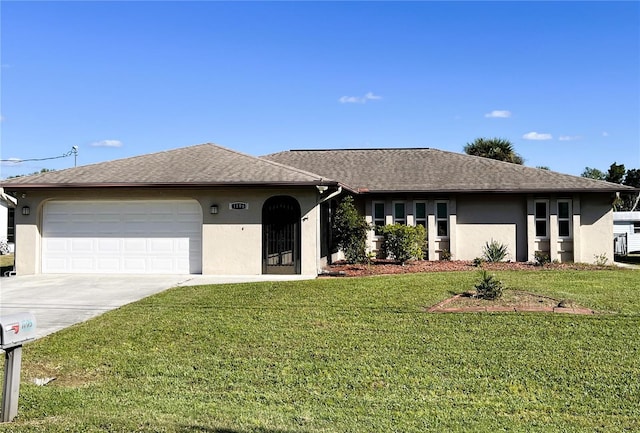 ranch-style house with a garage and a front lawn