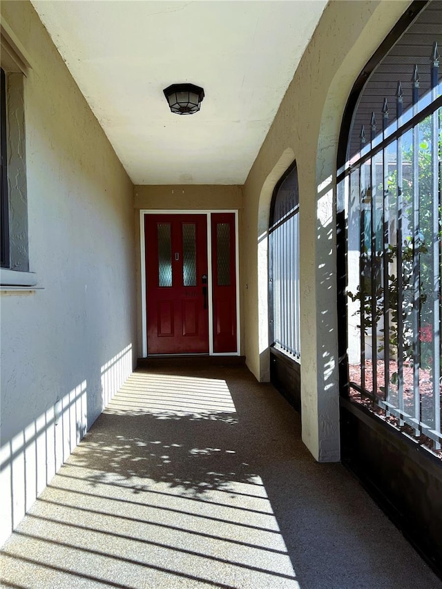 1196 Hinton St, Port Charlotte, FL 33952 - view of exterior entry with stucco siding
