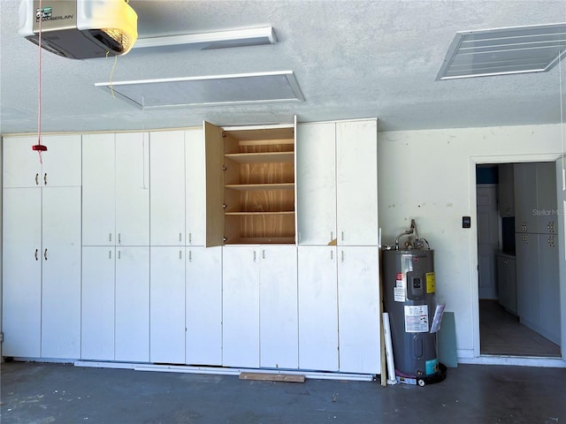 1196 Hinton St, Port Charlotte, FL 33952 - garage featuring a garage door opener and electric water heater