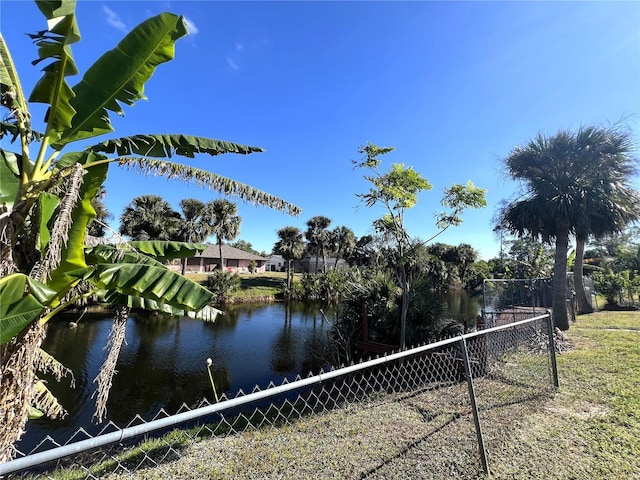 view of community with a water view