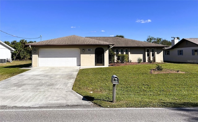 ranch-style home with central air condition unit, a front yard, and a garage