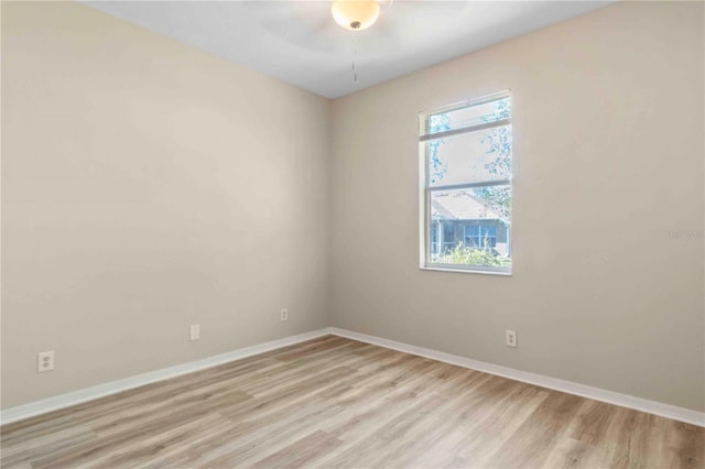 unfurnished room featuring light hardwood / wood-style floors