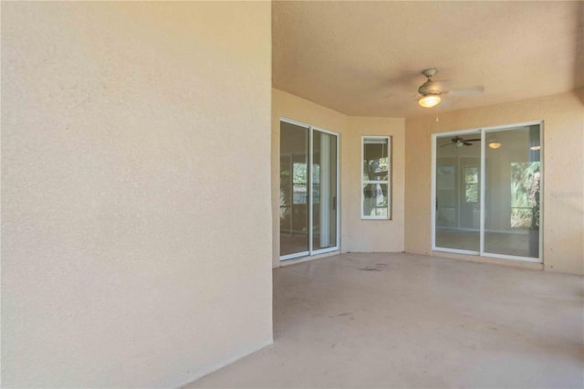 view of patio / terrace featuring ceiling fan