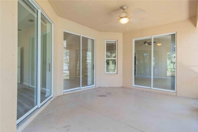 view of patio with ceiling fan