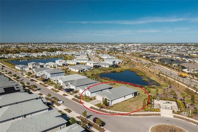 drone / aerial view featuring a water view