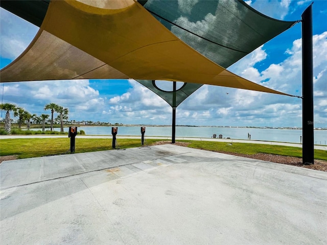 view of patio / terrace with a water view