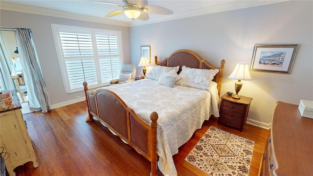 bedroom with ceiling fan, wood-type flooring, and ornamental molding